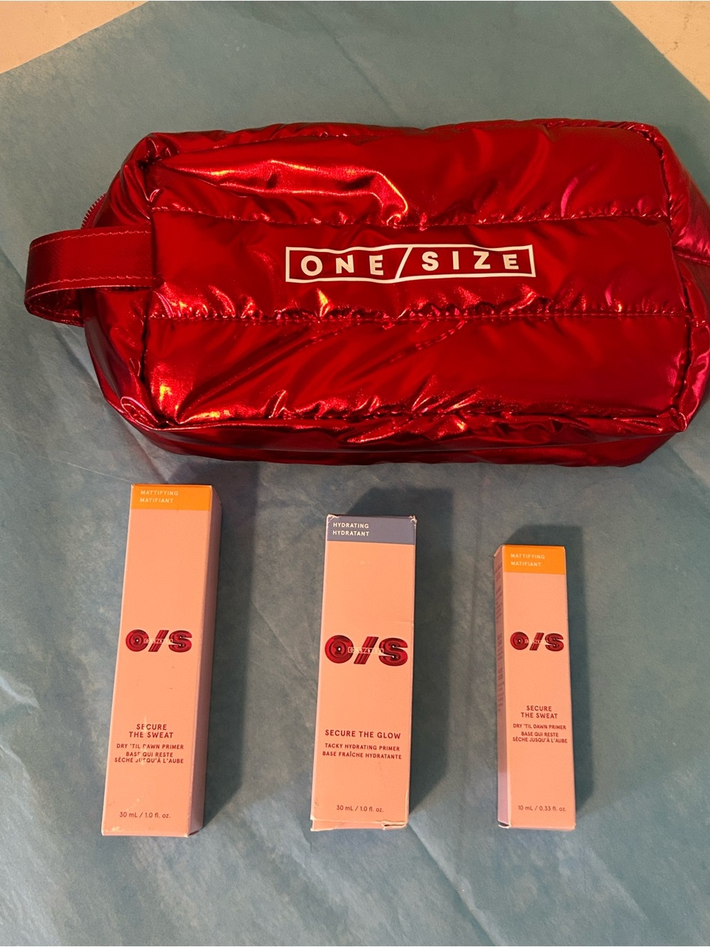 ONE/SIZE Primers set. Two full sized, one travel and red metallic bag
